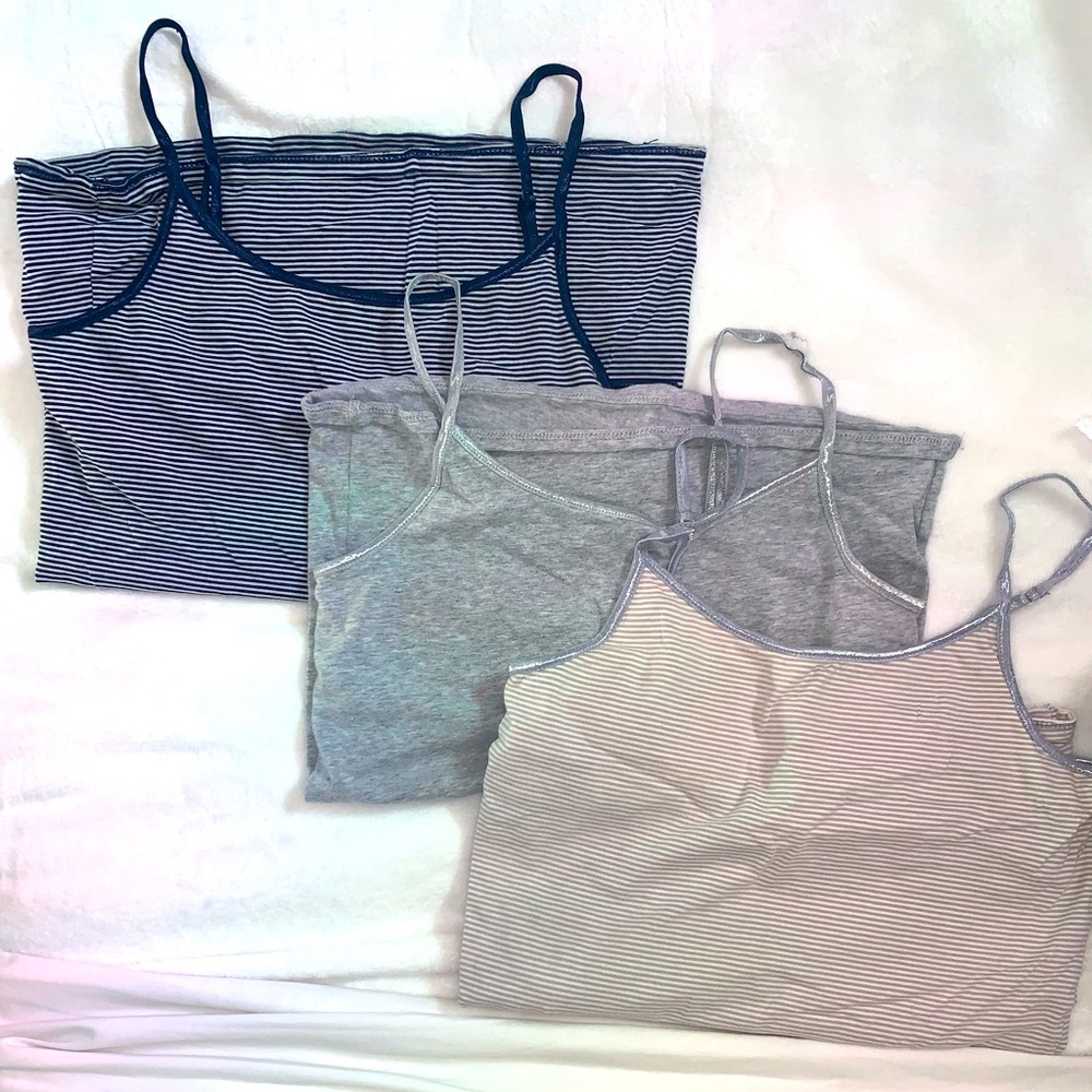 Three fitted stretchy tank tops